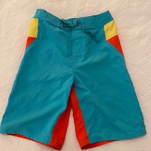 Patagonia color block boys board shorts.
